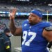 New York Giants defensive tackle Dexter Lawrence II (97) waves to fans after defeating the Dallas Cowboys.