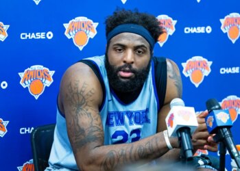 Mitchell Robinson #23, speaking to the media after practice at the New York Knicks training facility in Tarrytown, New York.
