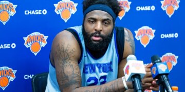 Mitchell Robinson #23, speaking to the media after practice at the New York Knicks training facility in Tarrytown, New York.