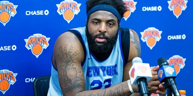 Mitchell Robinson #23, speaking to the media after practice at the New York Knicks training facility in Tarrytown, New York.