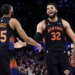 A smiling Karl-Anthony Towns celebrates with Mikal Bridges during the Knicks' Game 5 blowout win over the Hawks.