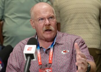 Andy Reid speaking at the NFL annual meetings.