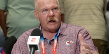 Andy Reid speaking at the NFL annual meetings.