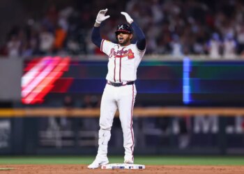 Dominic Smith reacting at second base after hitting a bases-clearing double.