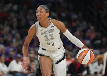 Las Vegas Aces center A'ja Wilson (22) against the Phoenix Mercury during the first half of Game 4 of the WNBA basketball finals, Friday, Oct. 10, 2025, in Phoenix.