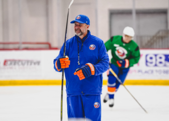 New Islanders coach Peter DeBoer on the ice.