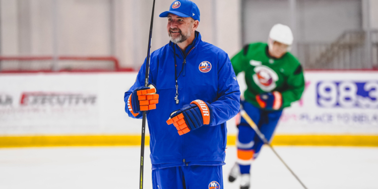 New Islanders coach Peter DeBoer on the ice.