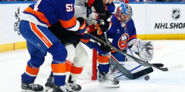 New York Islanders goaltender Ilya Sorokin (30) makes a save against the Philadelphia Flyers during the second period of an NHL hockey game, Friday, April 3, 2026 in Elmont, N.Y.