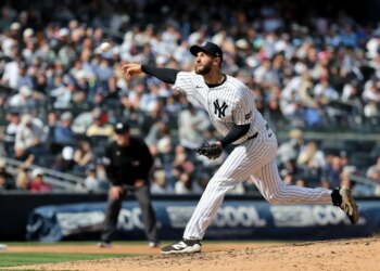 New York Yankees pitcher Jake Bird (59) throwing a pitch during the 7th inning against the Miami Marlins.