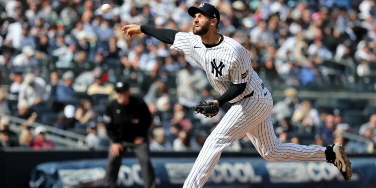 New York Yankees pitcher Jake Bird (59) throwing a pitch during the 7th inning against the Miami Marlins.