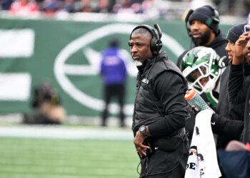 Buffalo Sabres defenseman Bowen Byram (4) celebrates his open net goal with defenseman Mattias Samuelsson (23) during the third period against the New York Islanders.