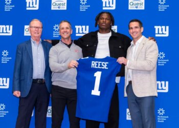 From left: Giants owner John Mara, head coach John Harbaugh, No. 5 overall pick Arvell Reese and GM Joe Schoen at the team facility for Reese's introduction on April 24, 2026.