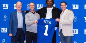 From left: Giants owner John Mara, head coach John Harbaugh, No. 5 overall pick Arvell Reese and GM Joe Schoen at the team facility for Reese's introduction on April 24, 2026.