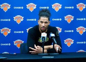 Josh Hart #3, speaking to the media after practice at the New York Knicks training facility in Tarrytown, New York.