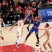 New York Knicks guard Josh Hart (3) shoots while Atlanta Hawks guard CJ McCollum (3) defends during Game 3 of the NBA Playoffs.