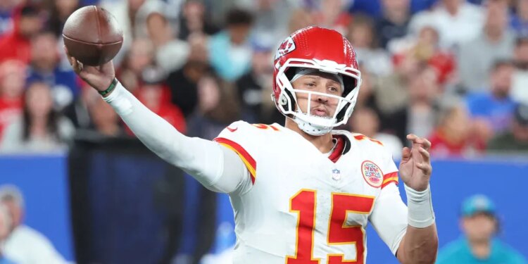 Patrick Mahomes throwing a football.
