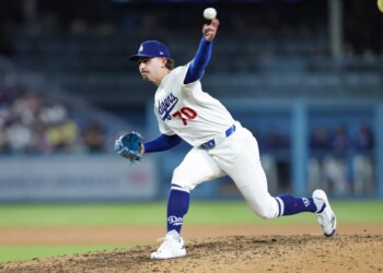 Justin Wrobleski (70) throws to a New York Mets batter during the seventh inning of a baseball game, Monday, April 13, 2026.