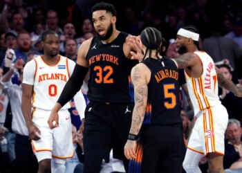 Karl-Anthony Towns is greeted by Jose Alvarado celebrate a score during the Knicks' 126-97 Game 5 blowout win over the Hawks on April 28, 2026 at Madison Square Garden.
