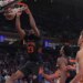 New York Knicks center Mitchell Robinson #23 dunks the ball during a game against the Atlanta Hawks.