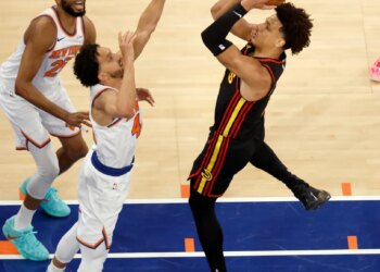 Atlanta Hawks forward Jalen Johnson (1) puts up shot as New York Knicks guard Landry Shamet (44) defends during the third quarter.