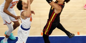 Atlanta Hawks forward Jalen Johnson (1) puts up shot as New York Knicks guard Landry Shamet (44) defends during the third quarter.
