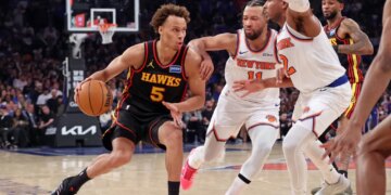 Atlanta Hawks guard Dyson Daniels (5) drives to the basket during the second quarter of Game 1 in the first round of the NBA playoffs.