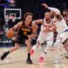 Atlanta Hawks guard Dyson Daniels (5) drives to the basket during the second quarter of Game 1 in the first round of the NBA playoffs.