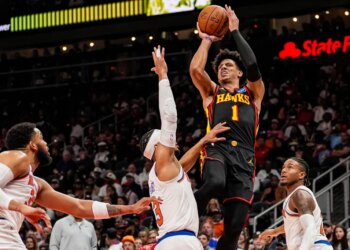 Atlanta Hawks forward Jalen Johnson (1) shoots over New York Knicks guard Josh Hart (3) during the second half.