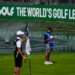 A caddie studies the putting green at the 18th hole during the first round of the LIV Golf tournament in Naucalpan on the outskirts of Mexico City.