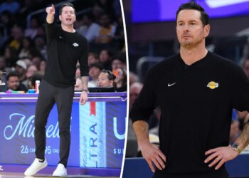 Lakers head coach J.J. Redick laces up custom made Nike sneakers for Autism Acceptance Month