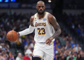 LeBron James dribbling against the Dallas Mavericks.