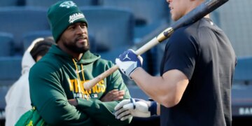 Luis Severino talks with Aaron Judge before the Yankees' 5-3 comeback win over the A's on April 7, 2026 at the Stadium.