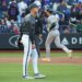 New York Mets pitcher Luke Weaver reacts as Athletics left fielder Tyler Soderstrom rounds the bases after hitting a three-run home run.