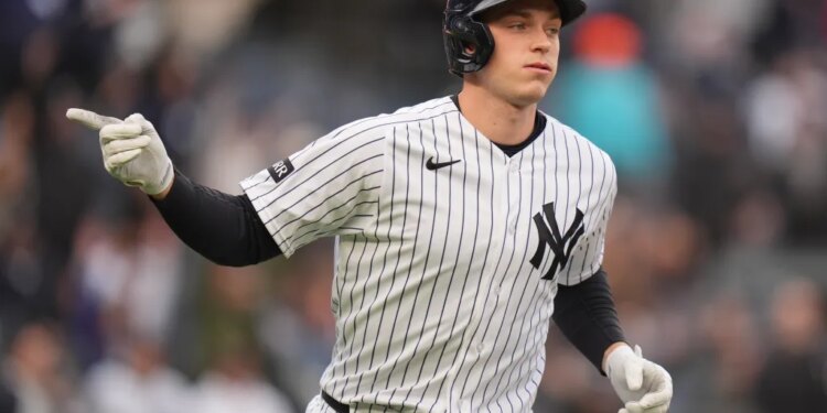 Ben Rice reacting after hitting a three-run homer.