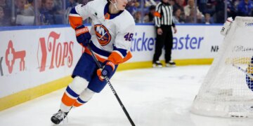 New York Islanders defenseman Matthew Schaefer (48) making a pass during a game against the Buffalo Sabres.