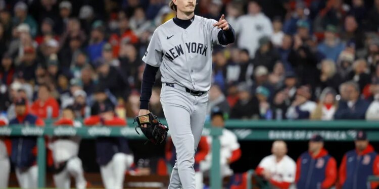 New York Yankees pitcher Max Fried (54) reacts after getting Boston Red Sox shortstop Andruw Monasterio (32) to ground out ending the sixth inning.
