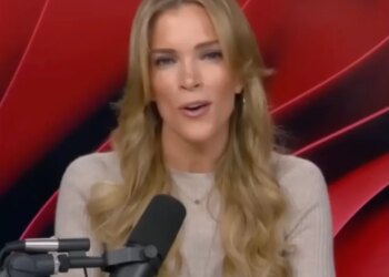 Megyn Kelly speaking into a microphone.
