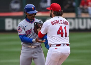 Francisco Lindor is tagged out by  first baseman Alec Burleson during the sixth inning of the Mets' 2-1, 11-inning loss to the Cardinals on April 1, 2026 in St. Louis.