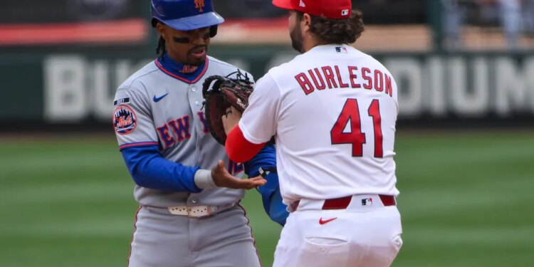 Francisco Lindor is tagged out by  first baseman Alec Burleson during the sixth inning of the Mets' 2-1, 11-inning loss to the Cardinals on April 1, 2026 in St. Louis.