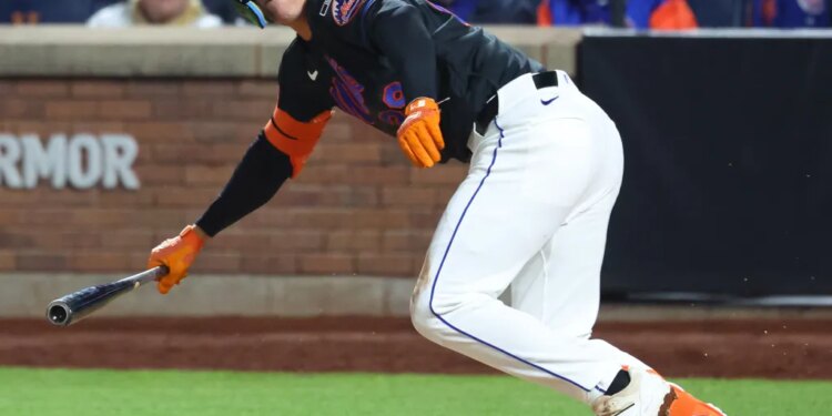 Jared Young bunts for a hit during the Mets' loss to the A's on April 10, 2026 at Citi Field.