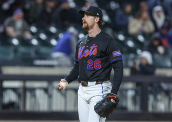 New York Mets starting pitcher Nolan McLean reacts after giving up a two-run home run.