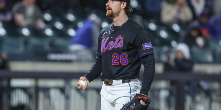 New York Mets starting pitcher Nolan McLean reacts after giving up a two-run home run.