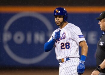 New York Mets left fielder Tommy Pham (28) celebrates a double in the eighth inning.