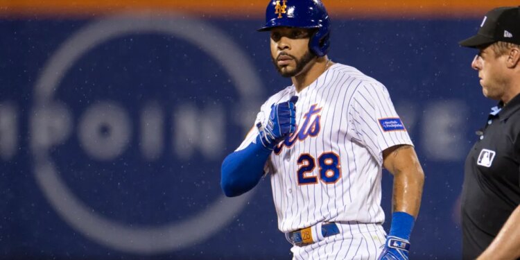 New York Mets left fielder Tommy Pham (28) celebrates a double in the eighth inning.