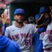 New York Mets starting pitcher Freddy Peralta (51) is congratulated by teammates after he was removed from the game during the sixth inning at Busch Stadium.