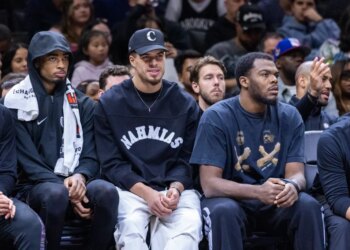 Nets center Nic Claxton (l.), Michael Porter Jr. (c.) and Day'ron Sharpe look on during the second half against the Atlanta Hawks at Barclays Center, Friday, April 3, 2026, in Brooklyn, NY.