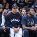 Nets center Nic Claxton (l.), Michael Porter Jr. (c.) and Day'ron Sharpe look on during the second half against the Atlanta Hawks at Barclays Center, Friday, April 3, 2026, in Brooklyn, NY.