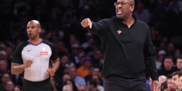 New York Knicks head coach Mike Brown reacts on the baseline during the first quarter.
