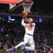 Knicks guard Jordan Clarkson (0) sores a layup against the Boston Celtics during the first half at Madison Square Garden.