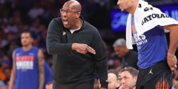New York Knicks head coach Mike Brown reacting intensely during a game.